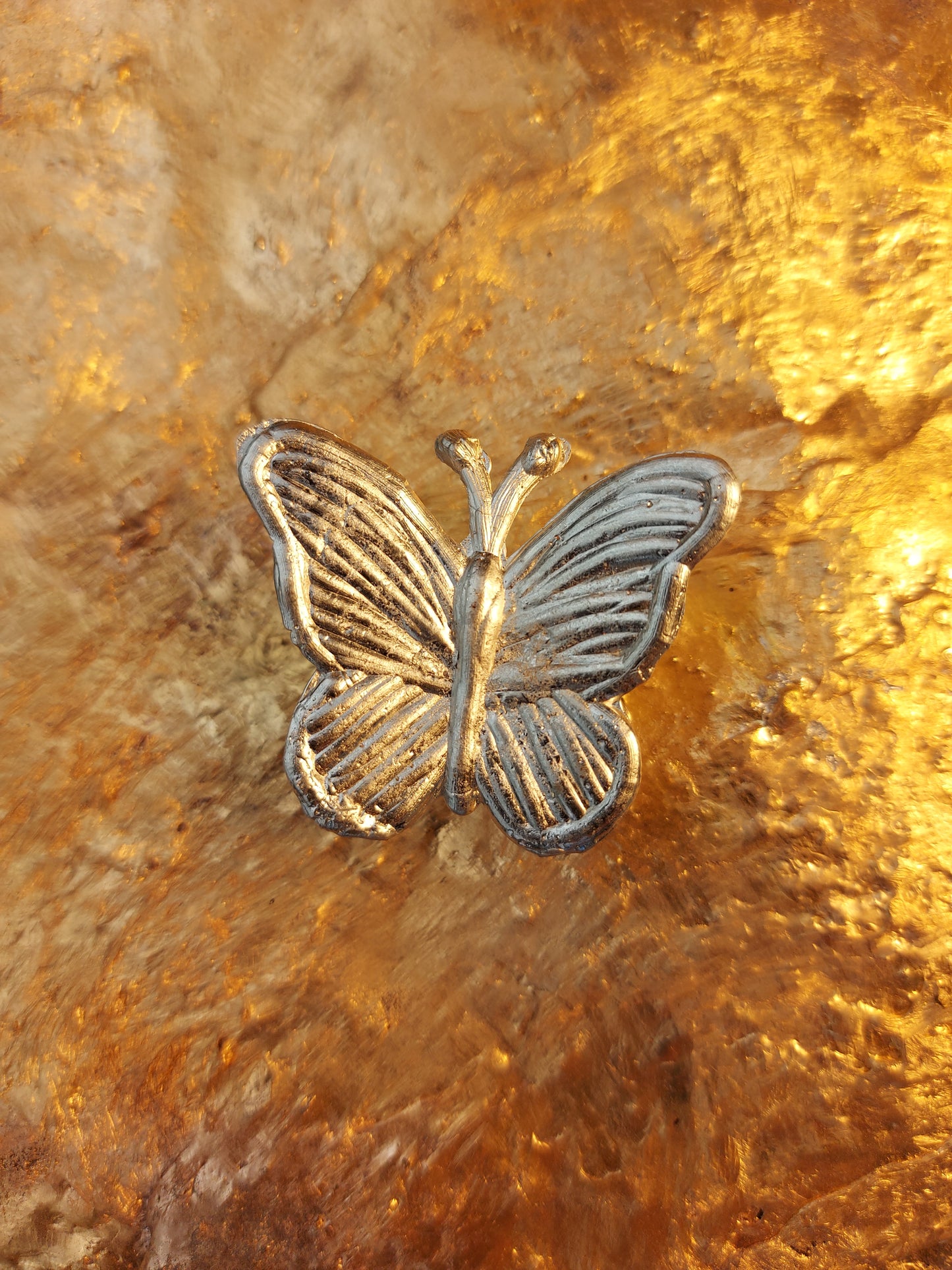 Gegossener Schmetterling Zitronenfalter