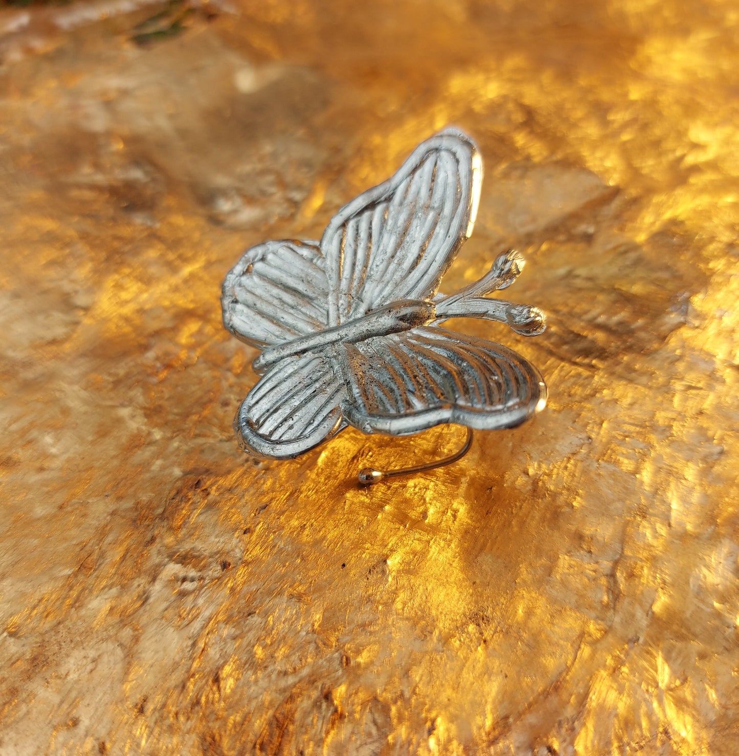 Gegossener Schmetterling Zitronenfalter
